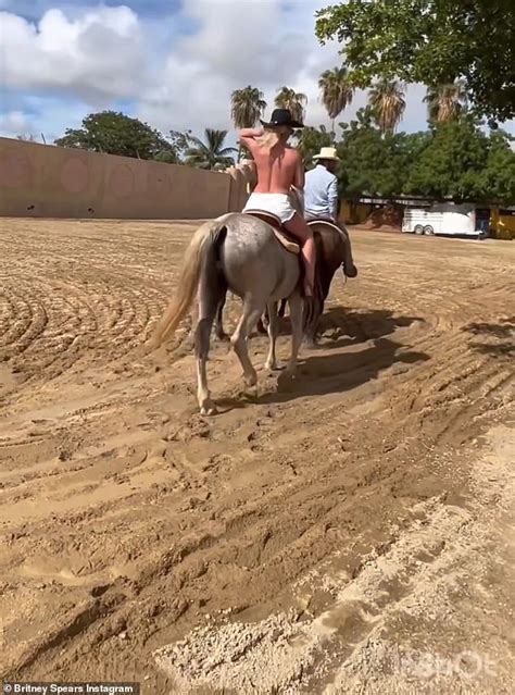 britney spears topless horseback riding|Britney Spears goes horseback riding TOPLESS in the desert。